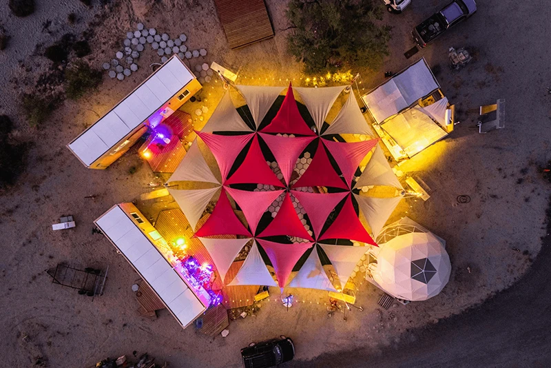 Nighttime Aerial View of the Nomadic Communal Space at Deanza Springs Nighttime Aerial View of the Nomadic Communal Space at Deanza Springs